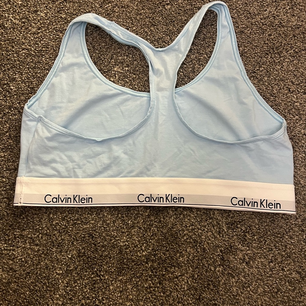 Calvin Klein sports bra. Baby blue. Never worn!